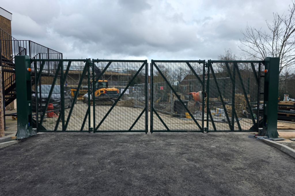 Bi-folding gate installation repair service commercial industrial Hertfordshire Midlands London – Industrial Gates and Barrier Systems