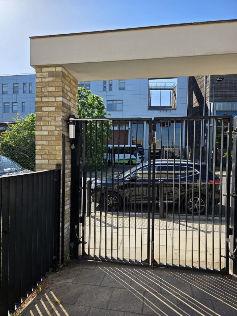 Automated swing gate installation pedestrian access in Bedfordshire, London — Industrial Gates and Barrier Systems